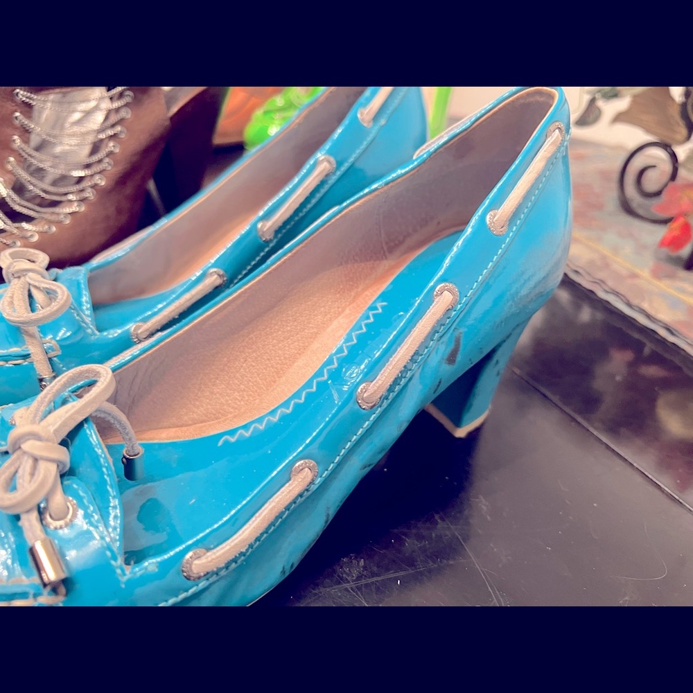 Designer shoes/ new to slightly worn